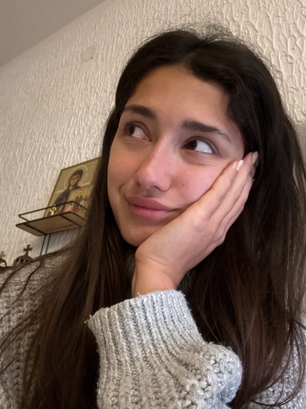 Woman takes morning selfies with dog in Montenegro home
