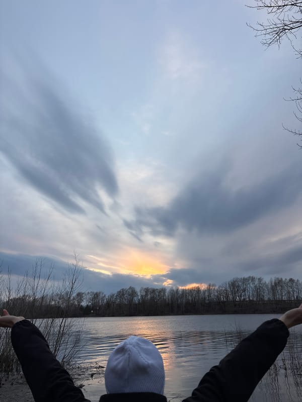 Peaceful sunset captured over water in Chaikovsky, Russia