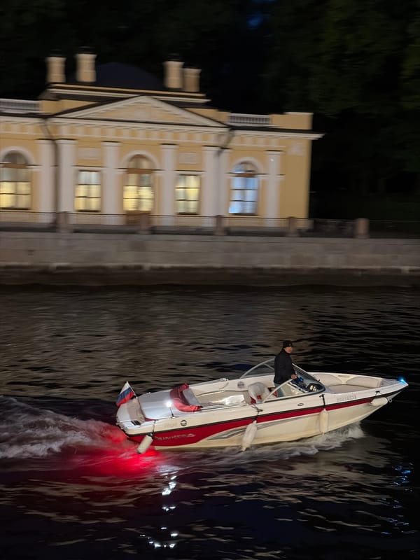 Evening scenes captured across Saint Petersburg including boats, architecture