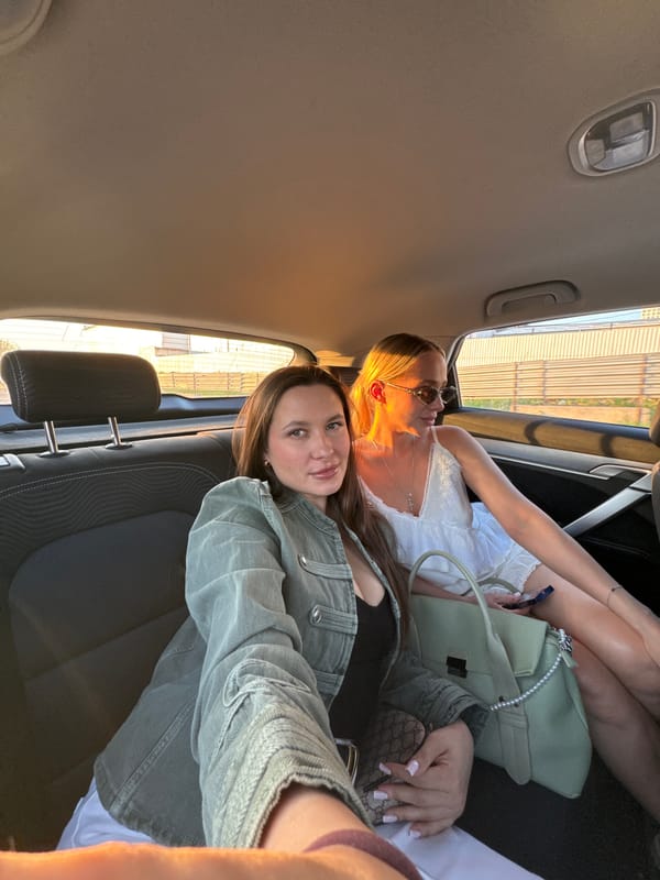 Two women photographed together in car in Odintsovo