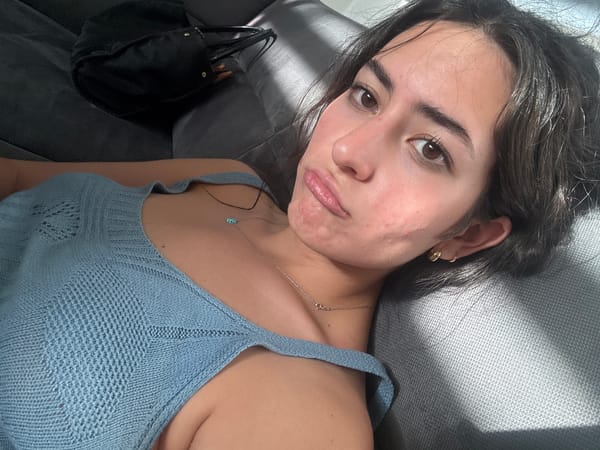 Woman relaxes, works on laptop at home in Mexico