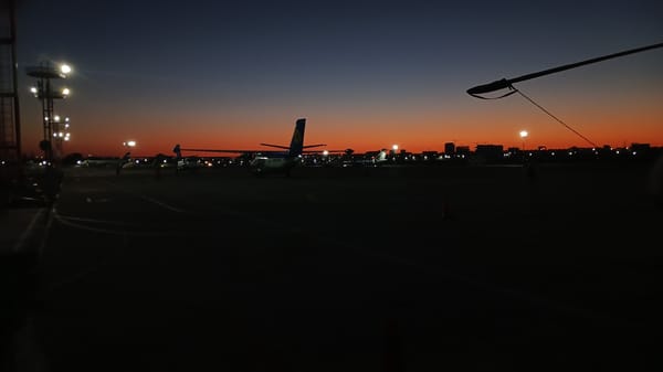 Tashkent airport tarmac at golden hour
