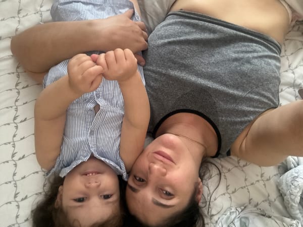 Mother and child share quiet domestic moments in Tobolsk home