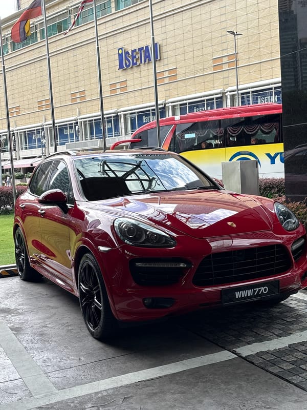 Red Porsche SUV spotted at multiple Kuala Lumpur locations