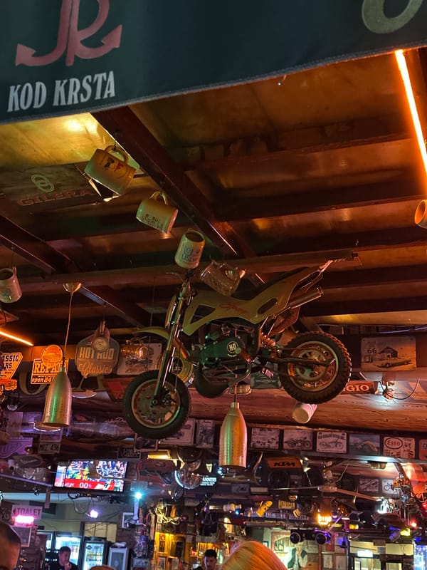 Summer night on the Budva waterfront: marina, rides, and food