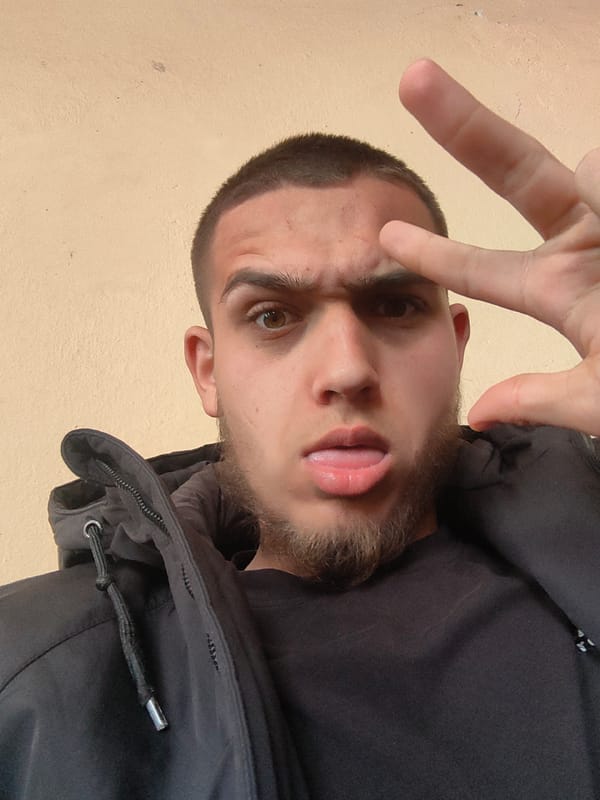 Young man photographs himself with juice in Bulgarian town