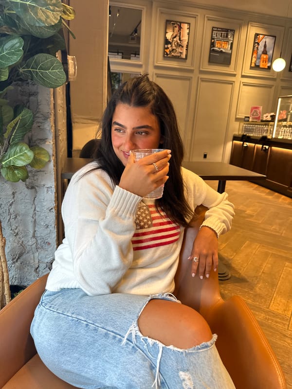 Woman photographed in modern NYC cafe Friday evening