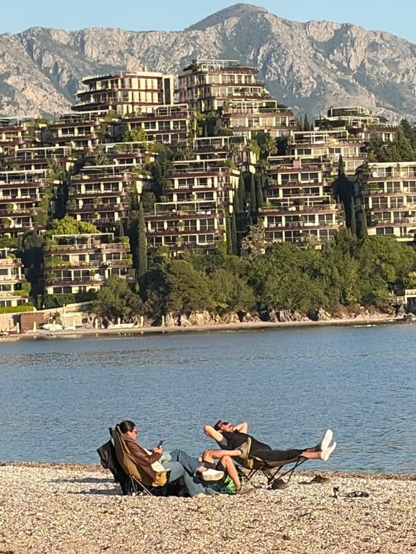 Coastal recreation captured at scenic waterfront dining and beach area