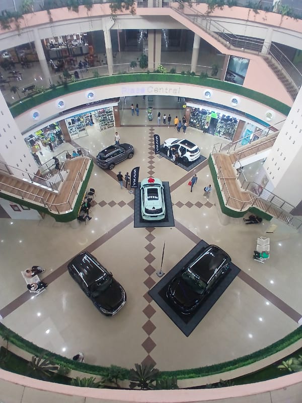Car display draws crowds in shopping mall atrium