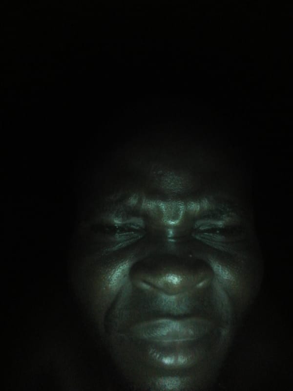 Person flashes peace sign in early morning Ikorodu photos