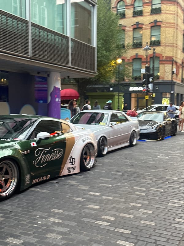 Luxury car gathering draws crowds in London's Soho district