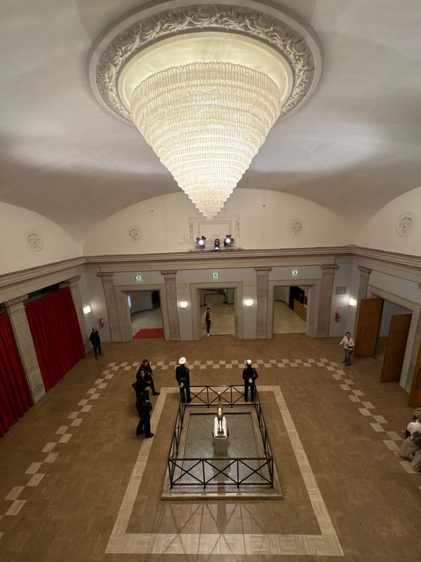 Crowded auditorium gathering documented in Rome public building