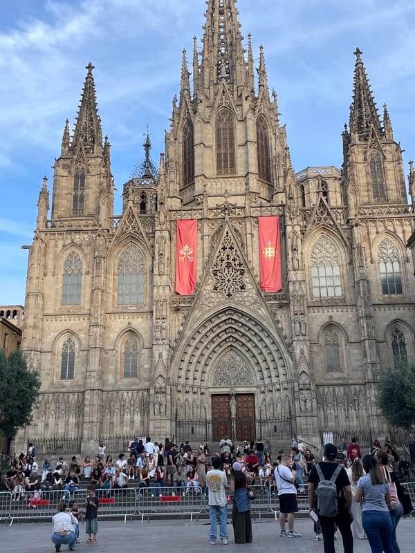 Barcelona Cathedral Gothic facade observed under cloudy skies