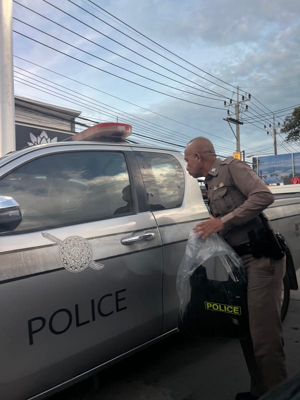 Police activity on a Ko Samui street, late morning