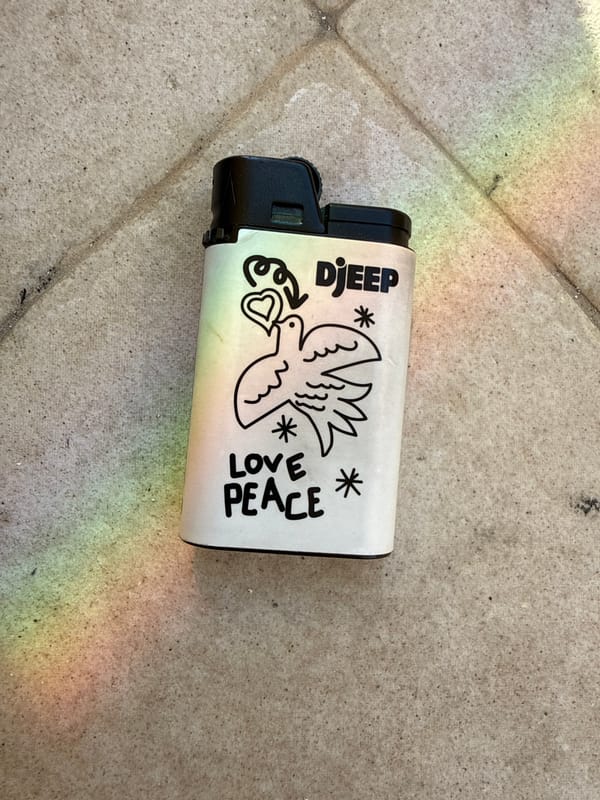 Decorative lighter with dove-heart design photographed in Bar, Montenegro