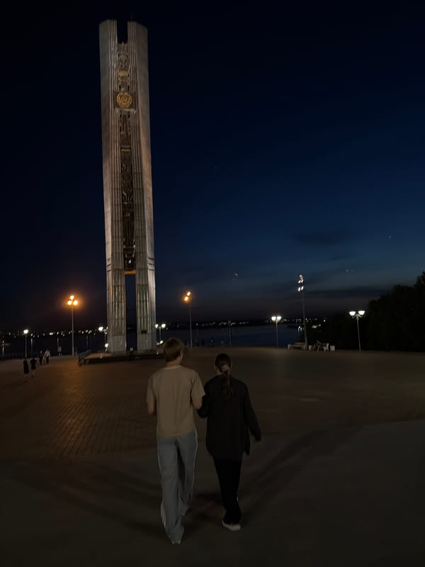 Evening visitors document landmarks across Izhevsk, Russia