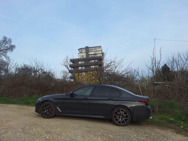 BMW sedan parked on gravel road in Varna