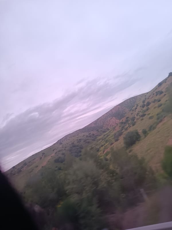 Overcast hillside landscape documented near Ait Siberne, Morocco