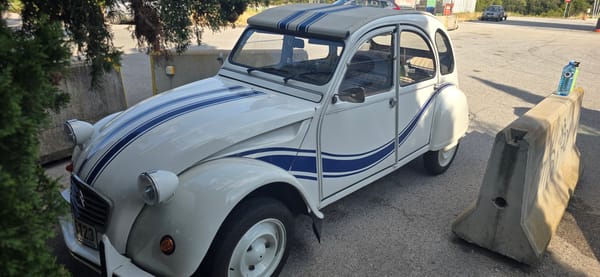 Striped Citroën 2CV with Andorran plates parked in Collbató