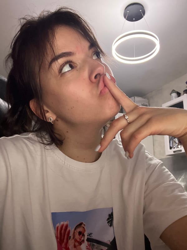 Woman photographed gaming setup with flowers in Shushary apartment