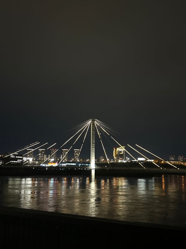 Nighttime illumination captured at Vinogradovsky Bridge, Krasnoyarsk
