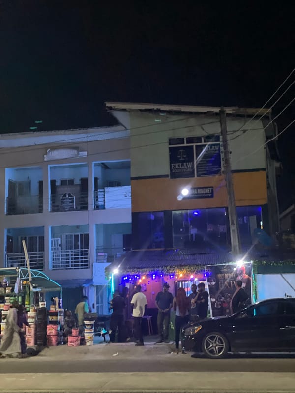 Evening street life documented in Ado, Nigeria commercial district