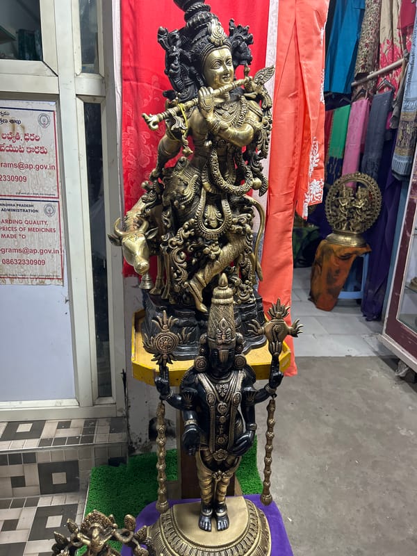 Men gather for tea at outdoor stall in Puttaparthi
