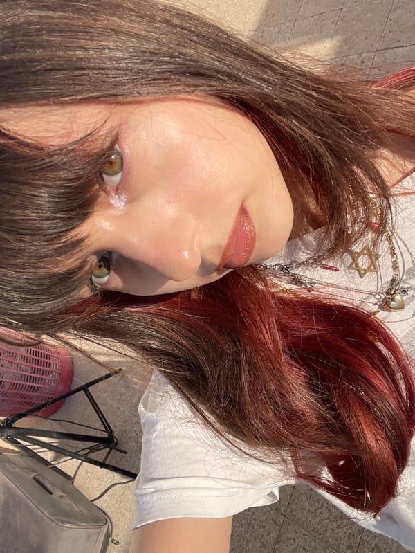 Young woman documents afternoon in Petah Tikva with selfies