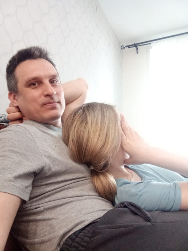 Couple observed relaxing indoors in Izhevsk, Russia