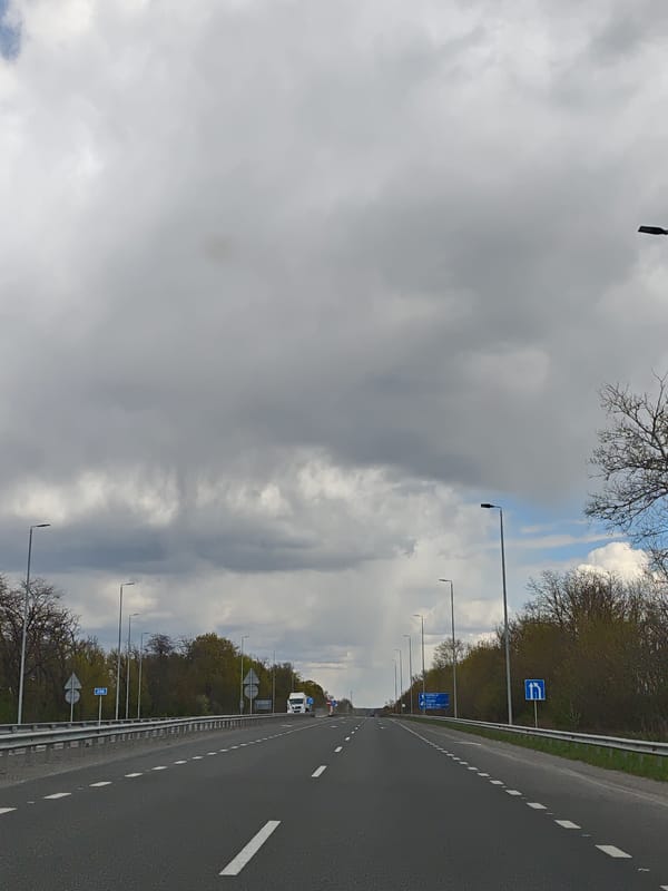 Light traffic observed on Holoskiv highway, single truck spotted