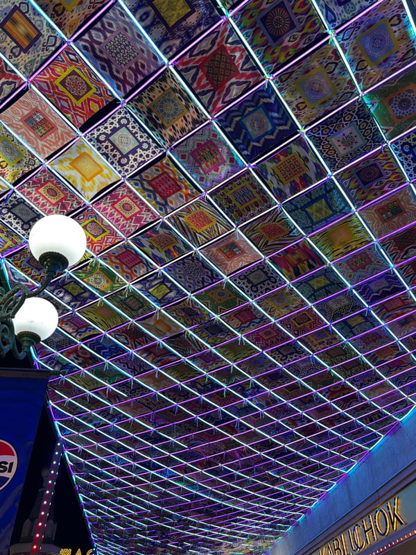Illuminated pedestrian canopy draws crowds in Tashkent entertainment district