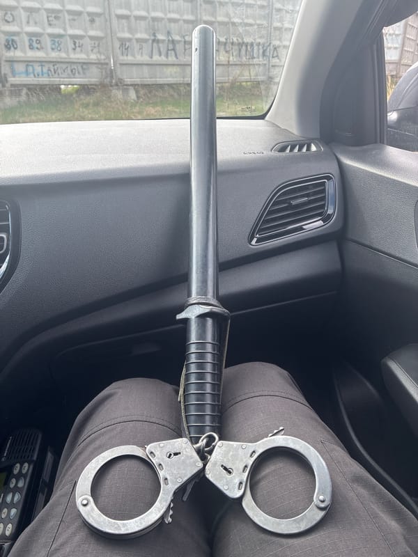 Police equipment observed in vehicle during patrol shift
