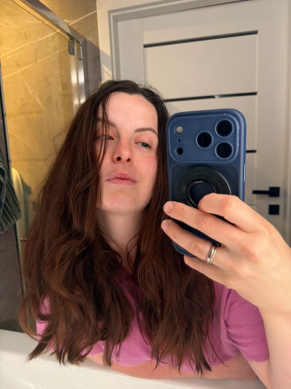 Woman documents evening routine with selfies and pet corgi