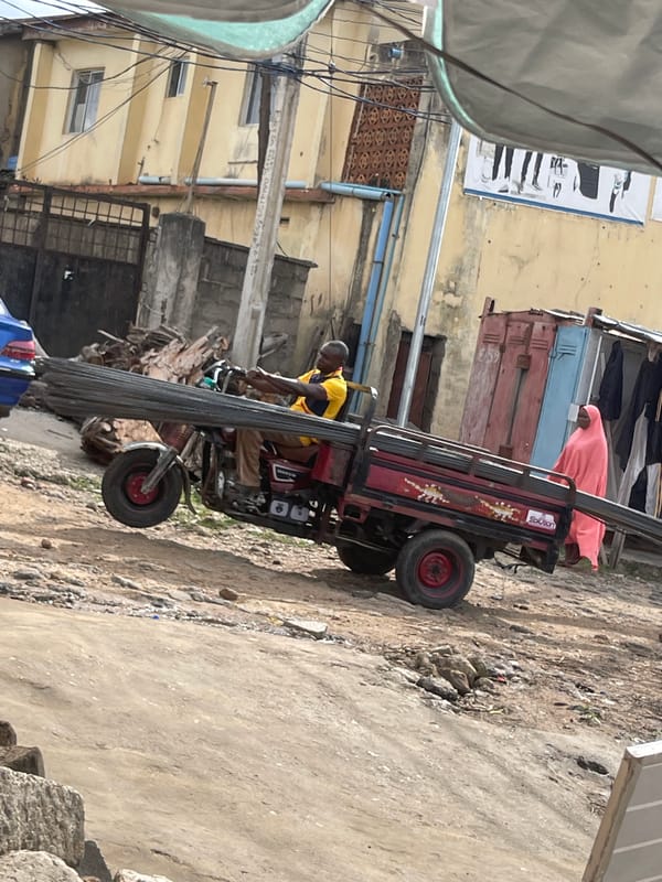 Mixed street traffic and daily movement in a busy semi-urban area