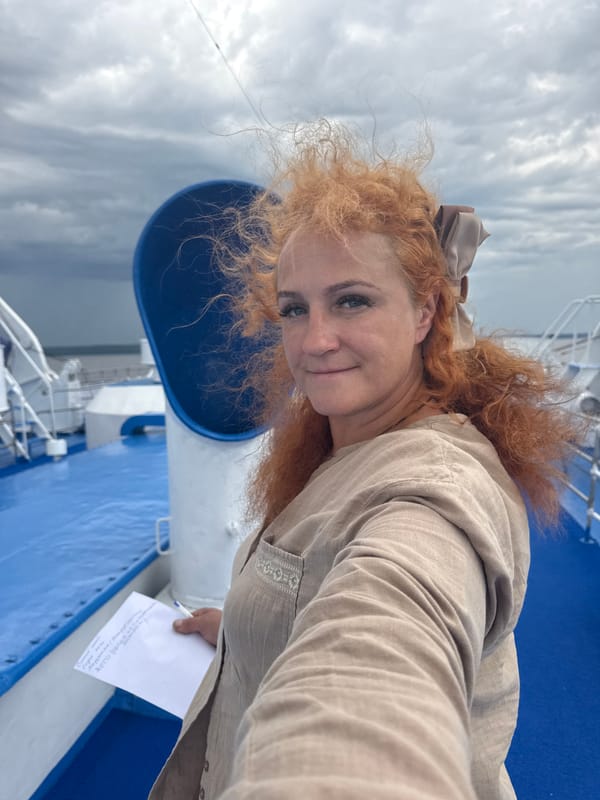 Ferry crossing the Volga under stormy skies near Ikskoe Ust'e