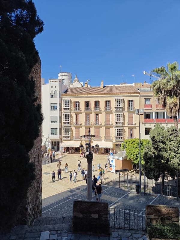 Witness captures elevated and interior views of Málaga square