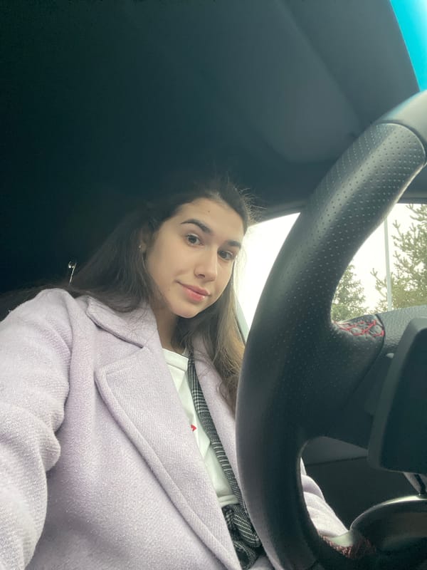Early morning sightings in Sofia: woman in car, gym-goer