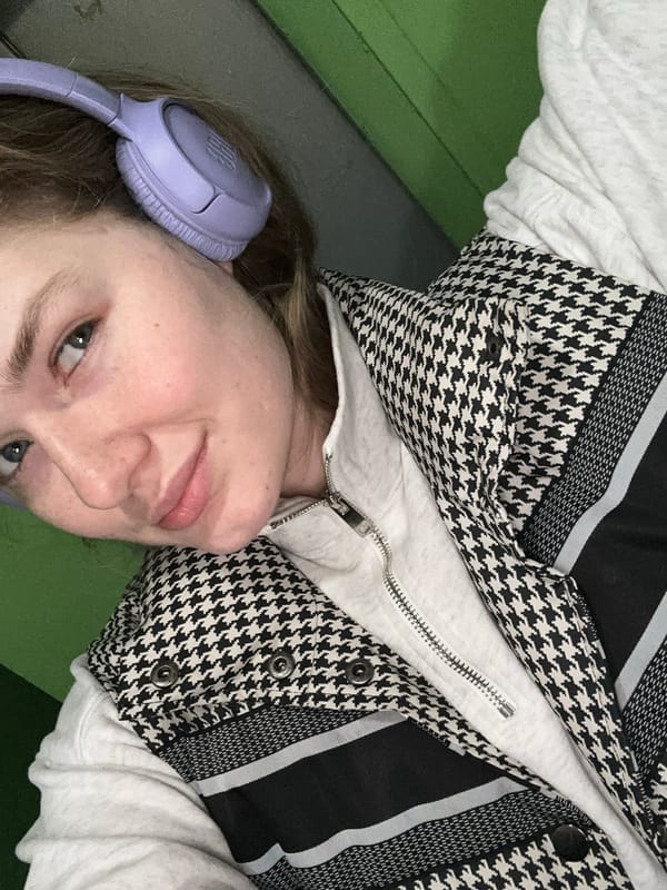 Woman with headphones rests in Kazan, Russia