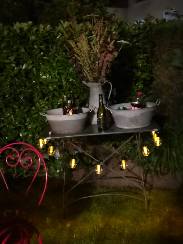 Garden dinner party with hanging chandeliers in Bettembourg