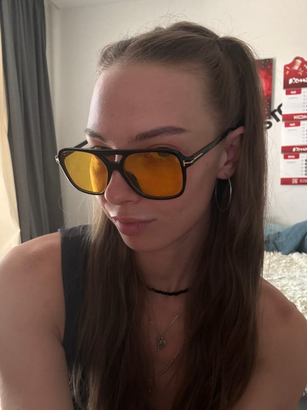 Woman takes indoor selfies, applies makeup during morning session