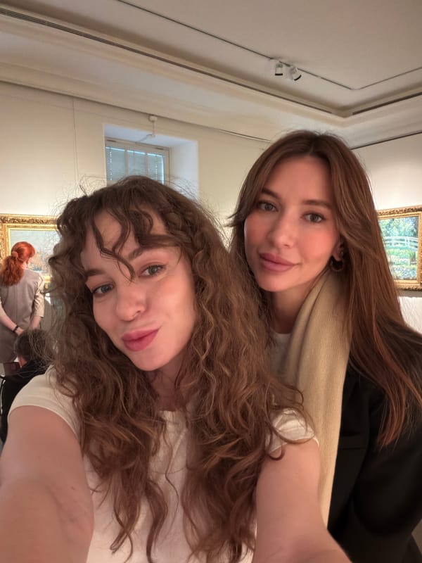 Women take selfie at Moscow art gallery