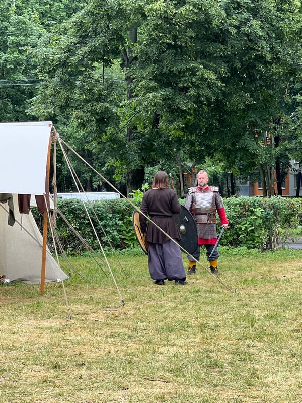 Medieval reenactment festival with crafts and combat in Moscow park