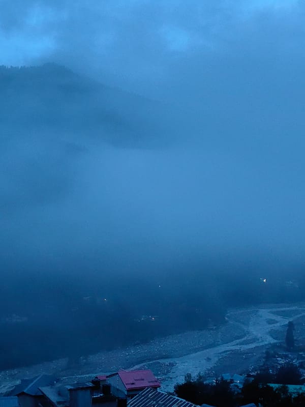 Vashisht village disappears into heavy evening fog and cloud