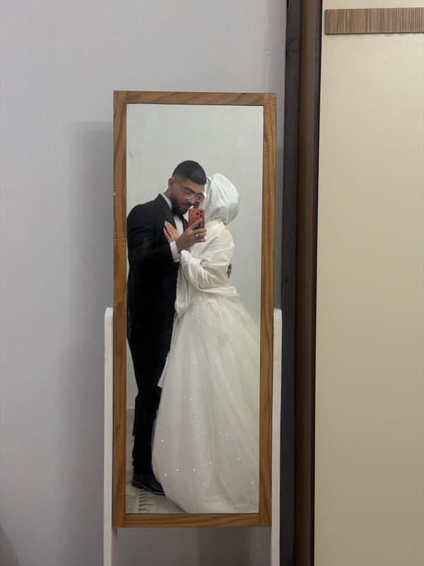 Wedding photo displayed on shelf in Gaza home
