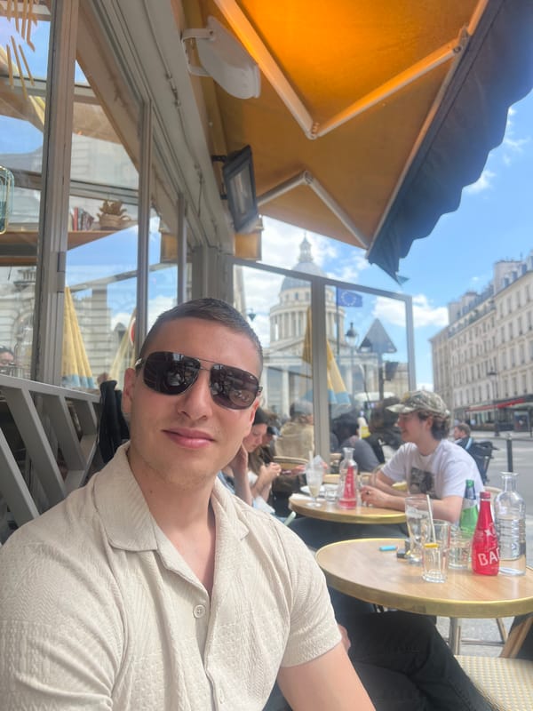 Couple enjoys sunny afternoon cafe date in Paris