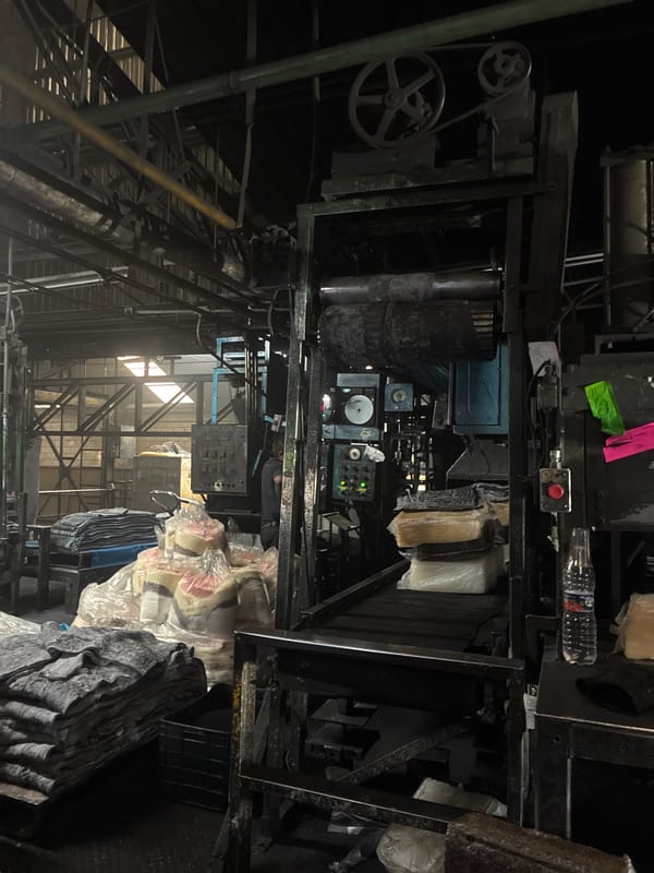 Carbon black supply and industrial floor inside a Cuautitlán factory