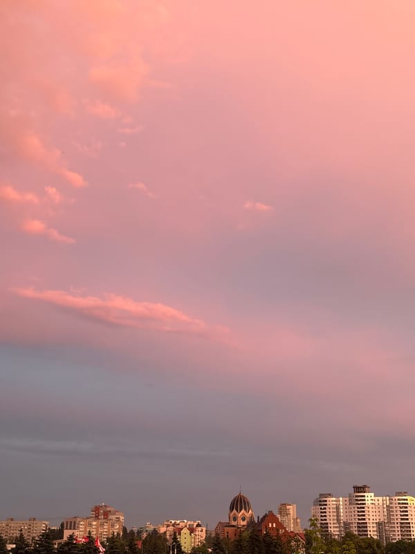 Kaliningrad skyline glows under a summer sunset sky