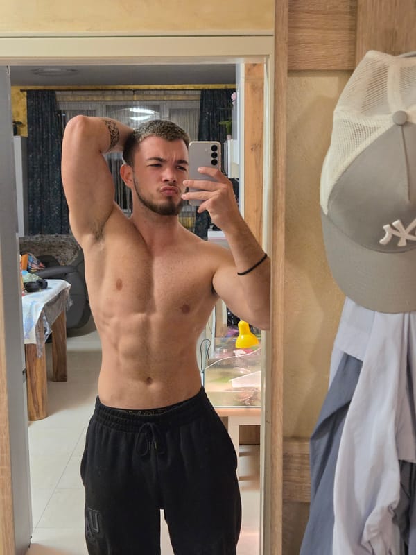 Man takes shirtless mirror selfie in Sofia