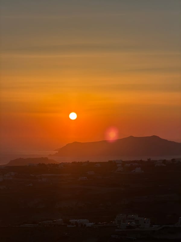 Santorini caldera sunset from multiple vantage points