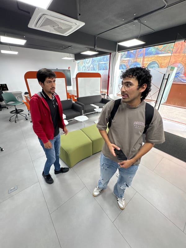 Red Porsche parked on university sidewalk in San Andrés Cholula